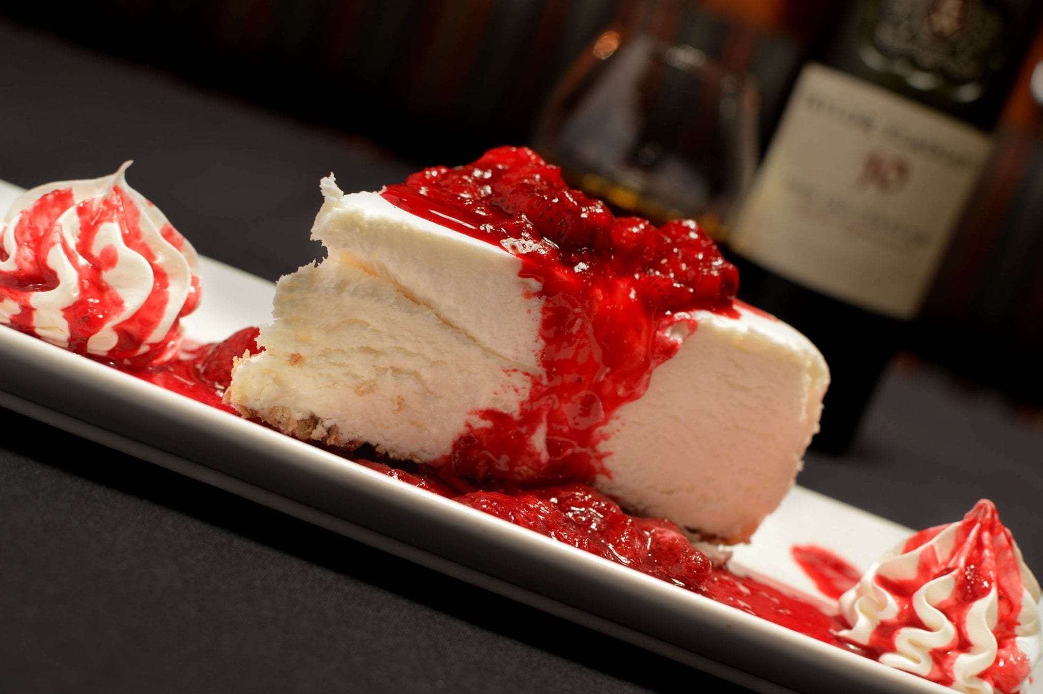 Strawberry cheesecake with whip cream