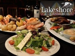 Lakeshore Restaurant EST. 1975. Steam vegetables in foreground with other surf and turf dishes in the back